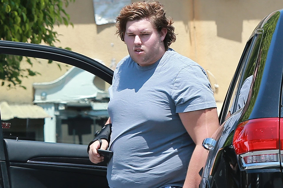 Сын "железного Арни" Кристофер явно не следит за лишним весом.