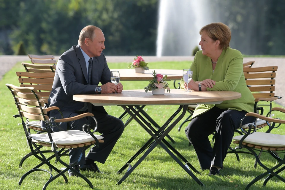 Президент России и канцлер Германии в загородной резиденции под Берлином