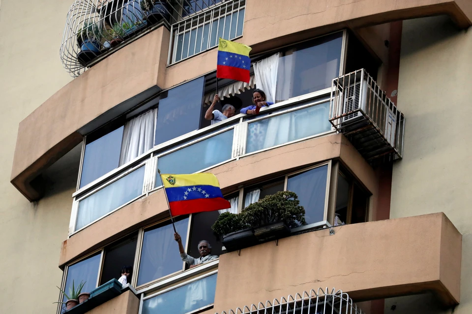 Флаги Венесуэлы на улицах Каракаса.