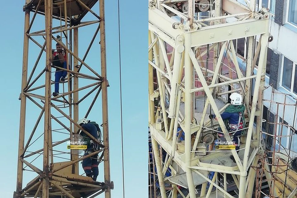 Рабочий на стройке залез на башенный кран и требовал выплатить ему зарплату. Фото: "Инцидент Новосибирск"