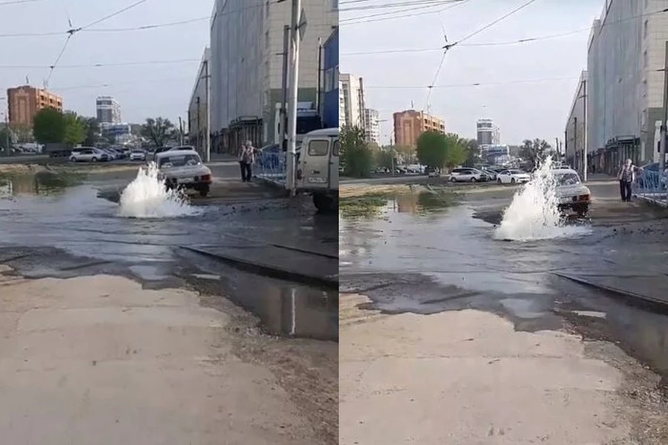 В Новосибирске в Ленинском районе прямо на проезжей части забил гейзер. Фото: Кадр из видео