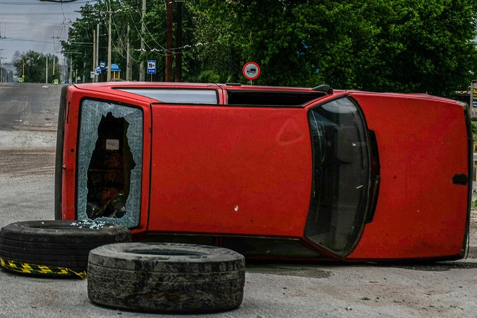 За попытку отстоять свой автомобиль жителям угрожали расстрелом