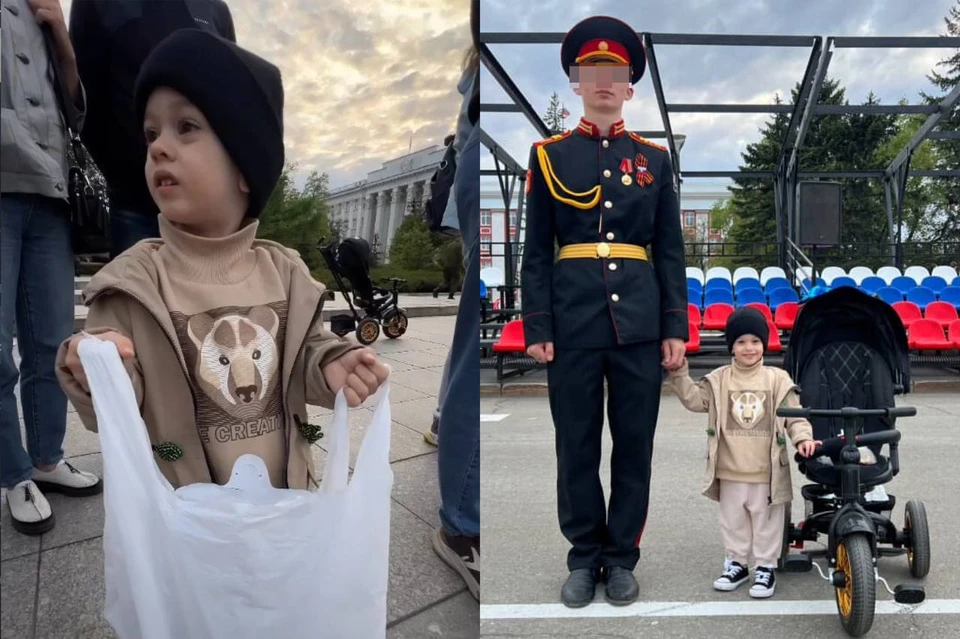 С одним из участников Парада малыш сфотографировался на память