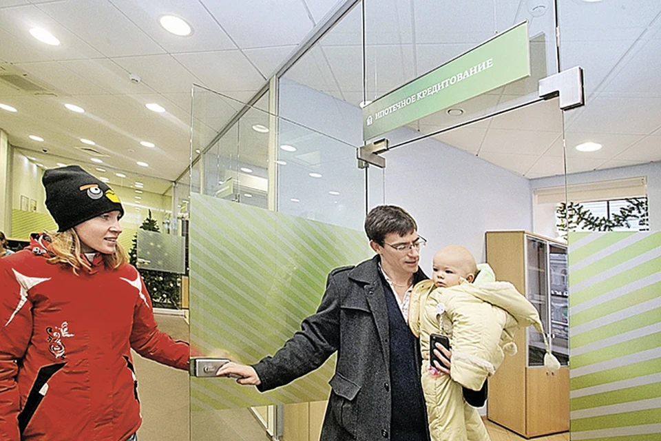 Нынче взять кредит - не менее важное решение, чем завести ребенка. Фото: PhotoXPress.ru